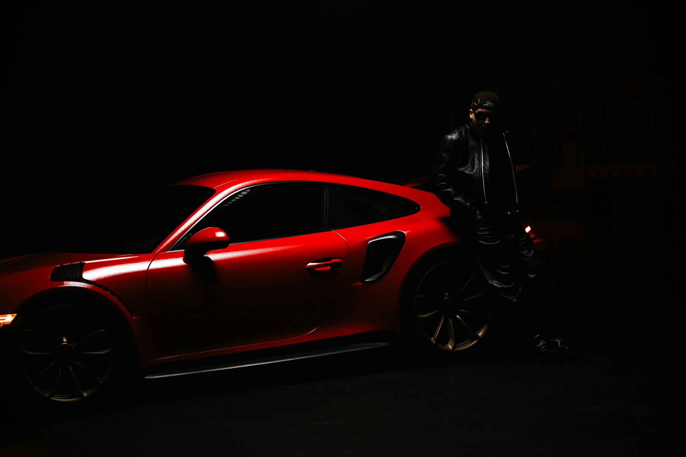 Sports car under dramatic studio light